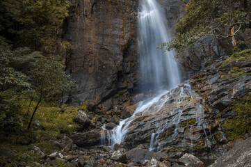 Fototapeta na wymiar A waterfall in Sri Lanka taken through slow shutter speed.