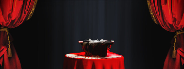 Smoke-filled magician top hat and magic wand on a theatre stage with red curtains and tassles