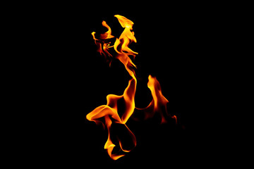 Real flames from underground gas isolated on black