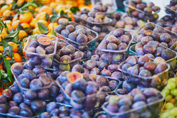 Large heap of ripe organic figs on farmer market in Paris, France