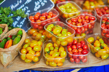Fresh organic colorful tomatoes on farmers market