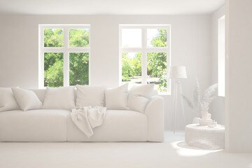Mock up of stylish room in white color with sofa and green landscape in window. Scandinavian interior design. 3D illustration