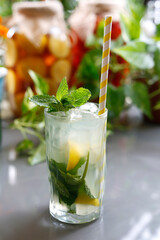 Mojito drink with rum, fresh mint, lime, ice, and water
Refreshing drink, culinary photography.