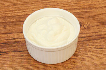 Sour cream in the bowl