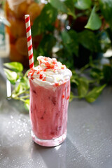 Strawberry smoothie with whipped cream.
Strawberry milk shake with whipped cream. A healthy dessert.