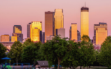 The skylines of downtown Minneapolis under golden hour	