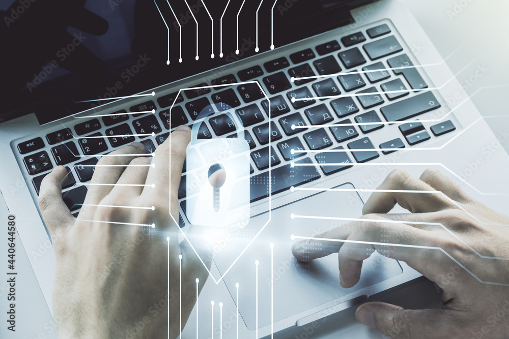 Poster double exposure of creative lock hologram with chip and hands typing on laptop on background. inform