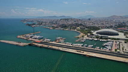 Aerial drone photo of famous and busy port of Piraeus where passenger ferries travel to Aegean destination islands as seen from high altitude, Attica, Greece