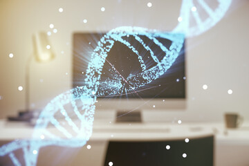Double exposure of creative DNA hologram on laptop background. Bio Engineering and DNA Research concept