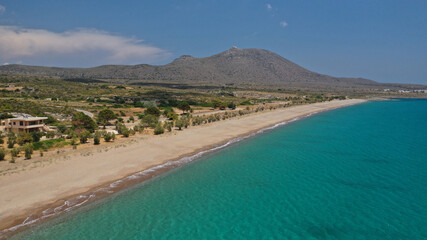 Aerial drone scenic photo from above of beautiful turquoise beach and small lake created by rocky Canyon, Mediterranean sea