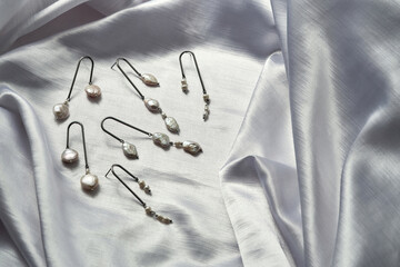 Elegant sterling silver dangle earrings with pearls