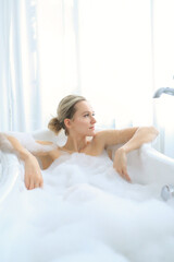 Fototapeta na wymiar Woman in a bathtub