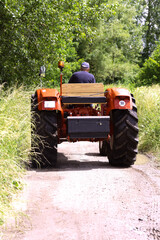 Red tractor in the countryside