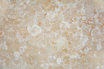 Textured yellow color background with messy ring pattern