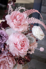 Preserved roses with dried flowers bouquet closeup. Eternal, stabilized, forever rose flower. Beautiful flowers.