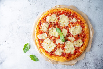 Pizza Margarita with tomato sauce and Mozzarella cheese