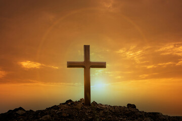 Cross on mountain sunset background. Easter concept. Concept conceptual black cross religion symbol...