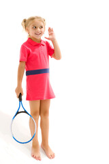 A little girl holds a tennis racket in her hands. Game, sports concept.