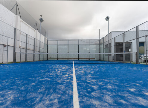 Wide Angle Image Of Blue Paddle Tennis Court Without People