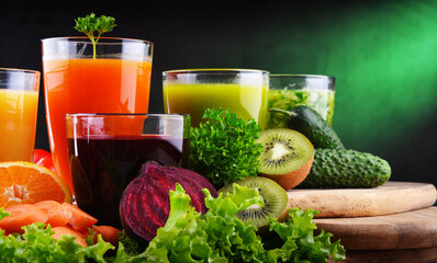 Glasses with fresh organic vegetable and fruit juices