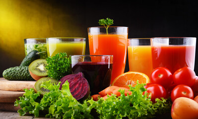 Glasses with fresh organic vegetable and fruit juices