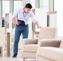 Sales assistant in furniture store