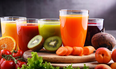 Glasses with fresh organic vegetable and fruit juices