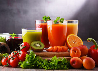 Glasses with fresh organic vegetable and fruit juices
