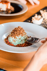 Delicious Ice Cream Dessert Close Up Basil Flavor Cashow Nuts Spoon Texture Menu Restaurant Gourmet Wooden Table