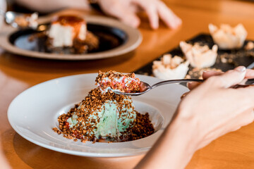 Delicious Ice Cream Dessert Close Up Basil Flavor Cashow Nuts Spoon Texture Menu Restaurant Gourmet Wooden Table