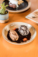 Delicious Dessert Chocolate Ice Cream Cashew Nuts Plate Brigadeiro Strawberry On a Wooden Table Restaurant