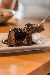 Delicious Dessert Petit Gateau Brownie Melted Chocolate Close Up Texture Chantilly Pie Plate Wooden Table