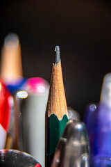 Pencil macro on a gray background. High quality photo