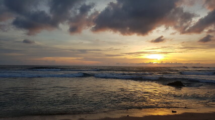 Fototapeta na wymiar Sunset on a beach in Jogjakarta