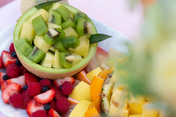 Kiwi, strawberry, melon and pineapple fruit platter