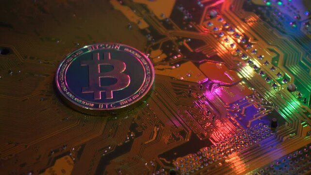 Golden bitcoin coin on server computer motherboard It is the currency that is exchanged and popular today in every country in the world. Concept business technology. Copy spece background