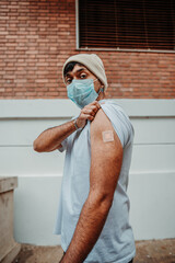 young man vaccinated against covid-19