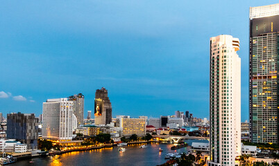 Fototapeta na wymiar Financial district in downtown Bangkok at twilight