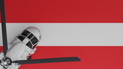 Fototapeta premium Top down view of a White Helicopter in the Bottom Left Corner and on top of the National Flag of Austria