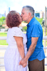 Naklejka premium couple kissing, National Day of the Elderly, International Day of the Third Age, s3nior life, kiss on the mouth, casual clothes