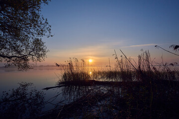 Morning by the lake. Beautiful spring sunrise