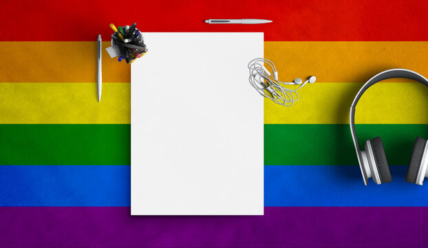 Colorful rainbow gay pride background with paper letter, bag, business card,stationery  and phone mail premium mockup simulation with a flag symbol of Lgbtq social movement behind stationary