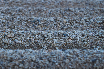 Detail of lines in a zen garden with raked gravel in Kyoto, Japan