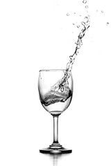water splash in glasses isolated on white