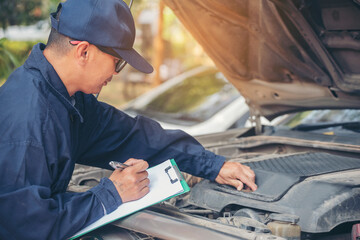 Mechanic car service auto garage in automotive mobile center. Technician workshop repair engine...