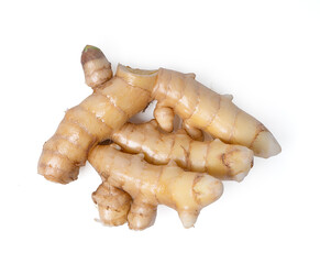 White turmeric root on white background.