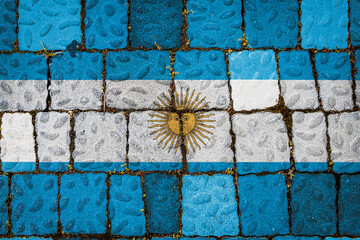 National flag of Argentina on stone  wall background. Flag  banner on  stone texture background.