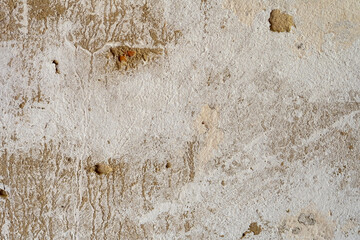 Old concrete wall, surface damaged by time, texture full of details