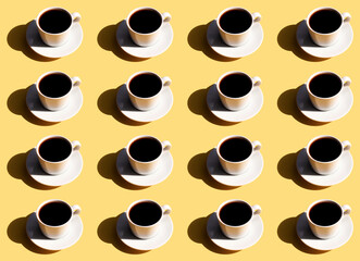 Pattern of coffee cup and plate, shadow of sun on beige terracotta background