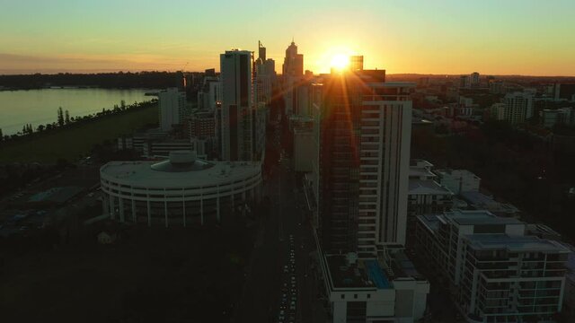 Sunset over Perth City CBD in Western Australia aerial footage.